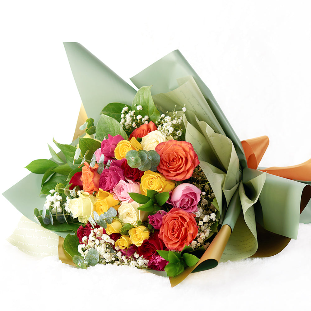 Mixed rose bouquet in red, yellow, and orange.